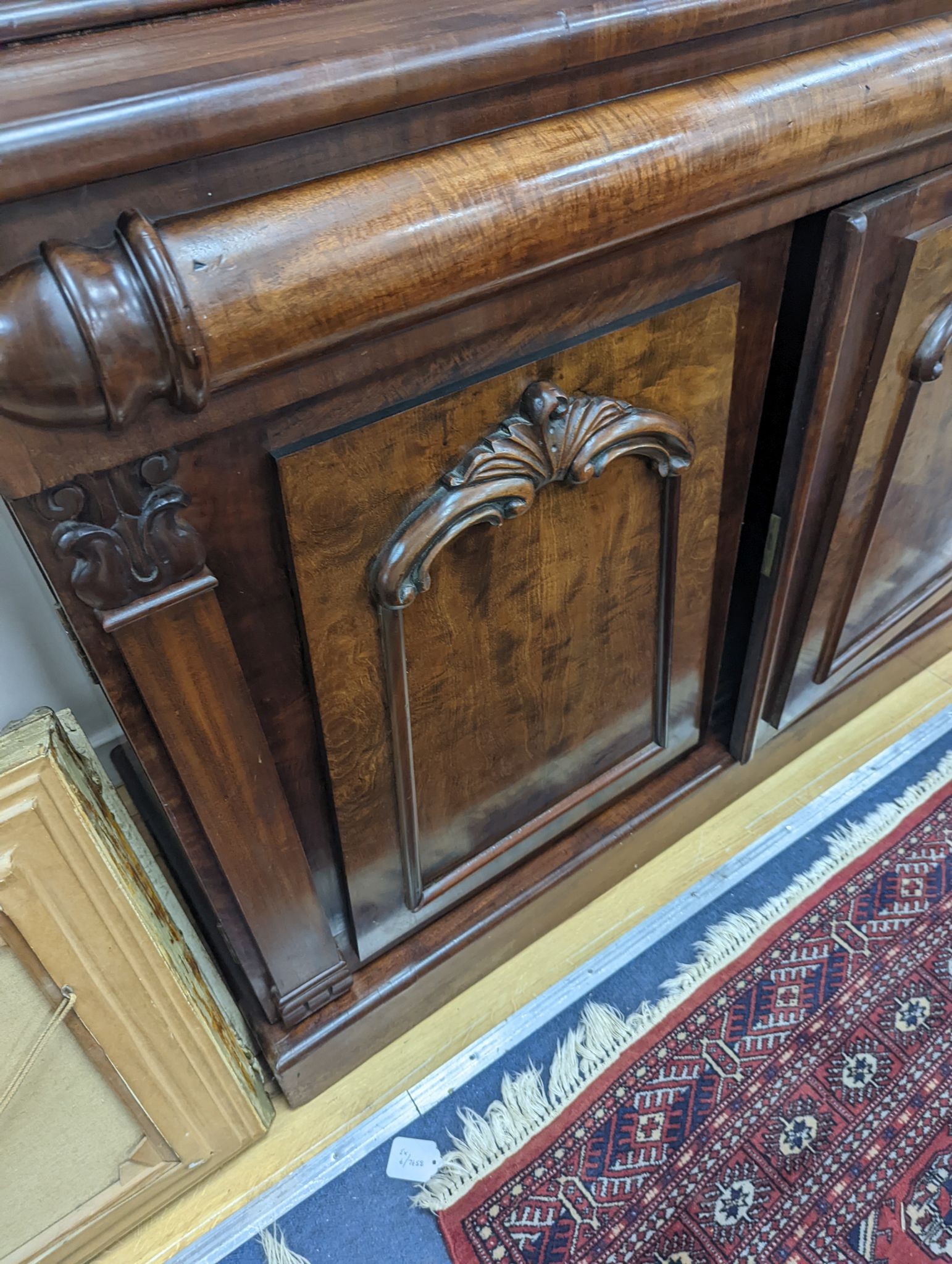 A mid Victorian mahogany bookcase, width 130cm, depth 54cm, height 230cm